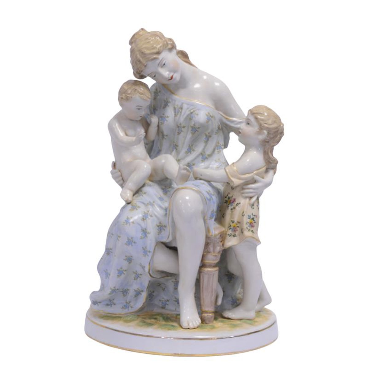 A PORCELAIN GROUP OF A MOTHER WITH TWO CHILDREN
