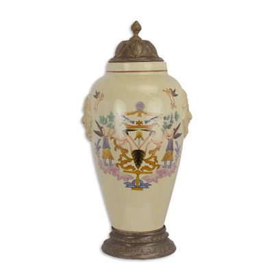 A PORCELAIN JAR AND COVER ON BRASS STAND