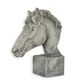 A RESIN AND MGO HORSE HEAD, DARK GREY
