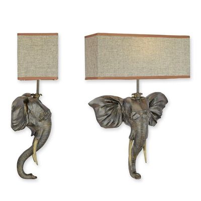 A RESIN ELEPHANT HEAD WALL LAMP