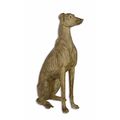 A RESIN FIGURE OF A SITTING GREYHOUND