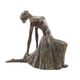A RESIN FIGURINE OF A BALLERINA