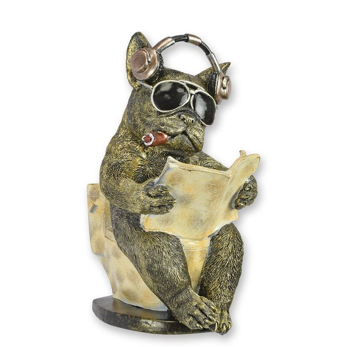 A RESIN FIGURINE OF A BULLDOG READING ON THE TOILET