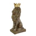 A RESIN FIGURINE OF A CROWNED LION