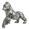 A RESIN FIGURINE OF A GORILLA - OLD SILVER