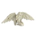 A RESIN FIGURINE OF A HOODED ANGEL