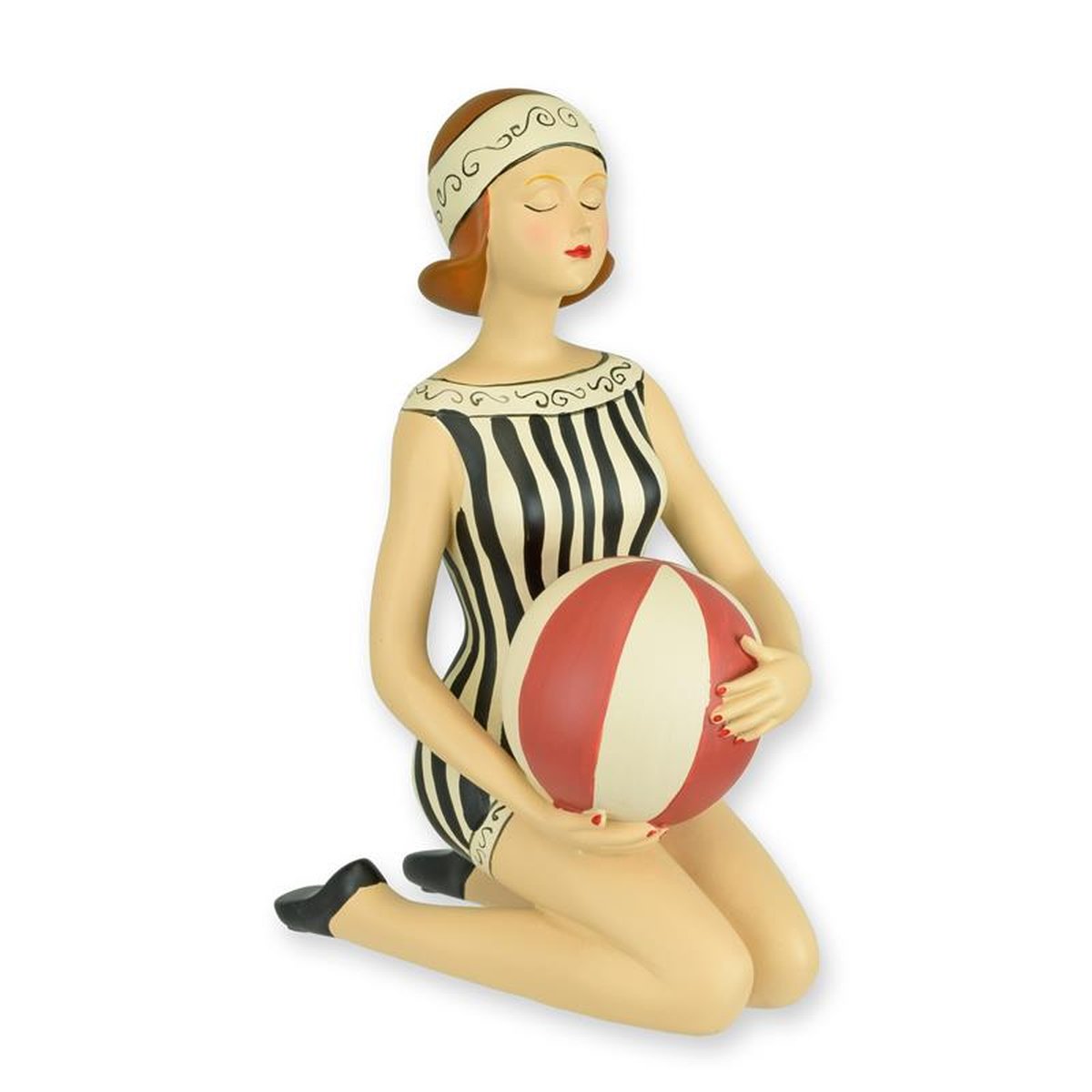 A RESIN FIGURINE OF A LADY WITH BEACHBALL