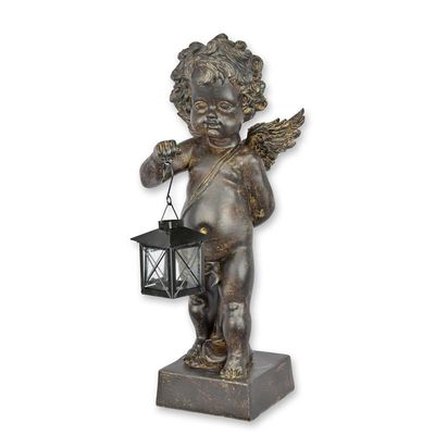 A RESIN FIGURINE OF A PUTTO HOLDING A LANTERN