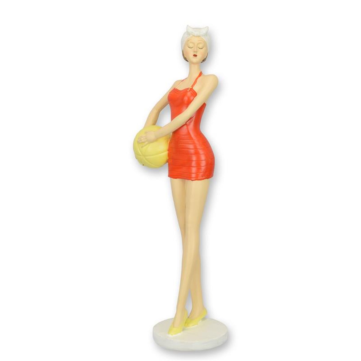 A RESIN FIGURINE OF A RETRO BEACH GIRL