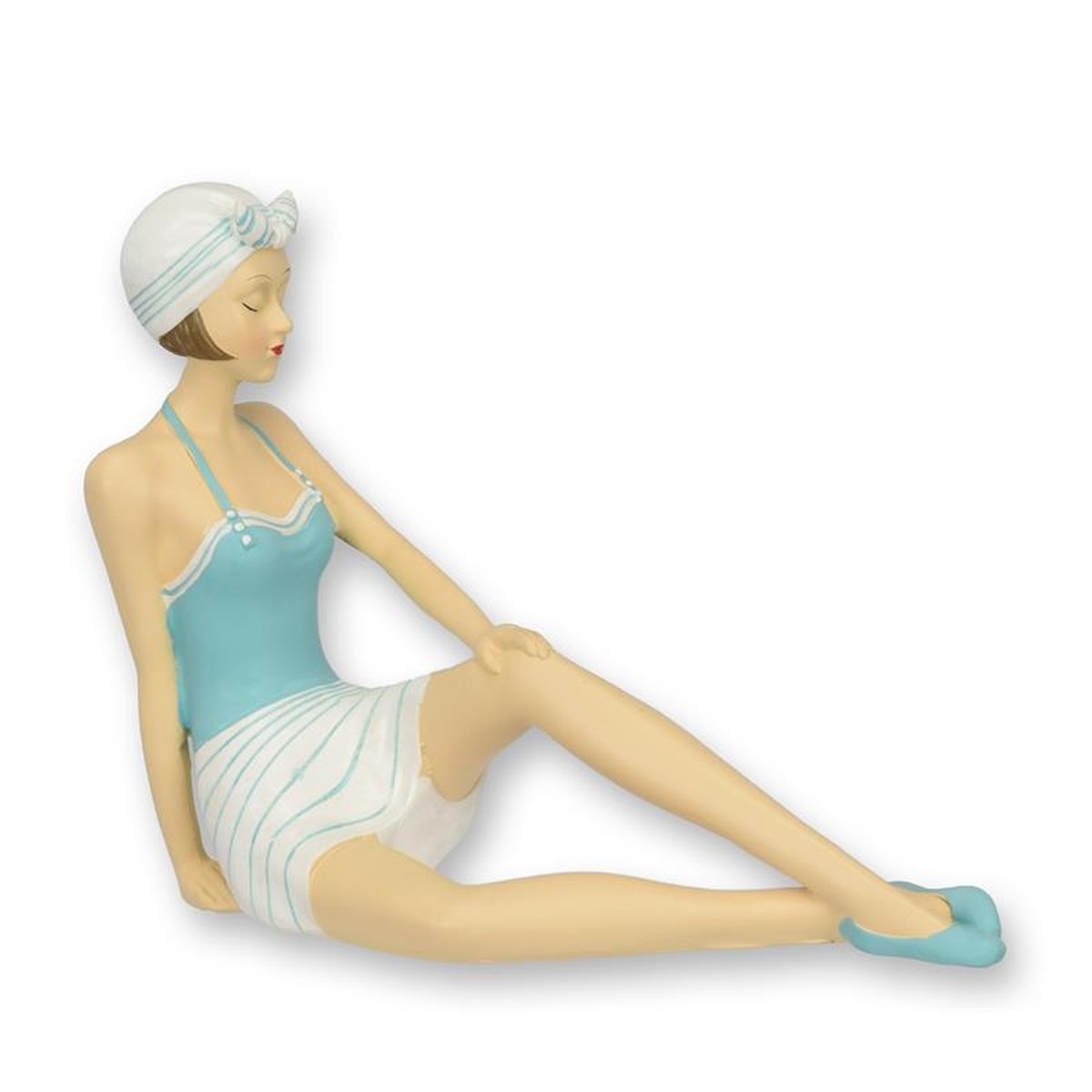 A RESIN FIGURINE OF A RETRO BEACH GIRL