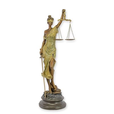A RESIN FIGURINE OF LADY JUSTICE