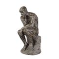 A RESIN FIGURINE OF THE THINKER""