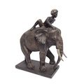 A RESIN GROUP OF AN ELEPHANT WITH RIDER