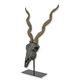 A RESIN IMPALA SKULL ON STAND