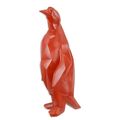 A RESIN POLYGONAL FIGURINE OF A PENGUIN, RED