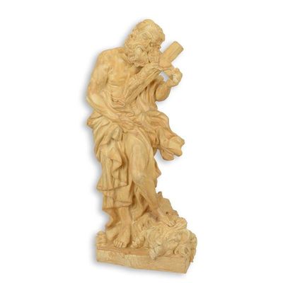 A RESIN STATUE OF A MAN HOLDING A CRUCIFIX