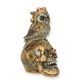 A RESIN STEAMPUNK FIGURINE OF A SKULL WITH OWL