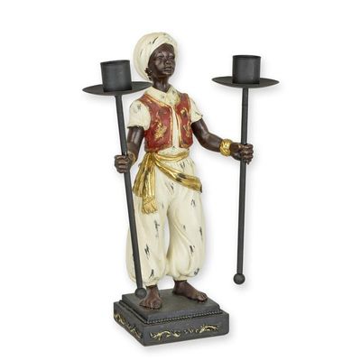 A RESIN VASSAL DOUBLE CANDLE HOLDER