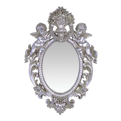 A RESIN WALL MIRROR FLANKED BY TWO PUTTI