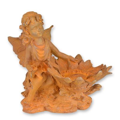 A RUSTY CAST IRON BIRDFEEDER