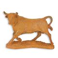 A RUSTY CAST IRON FIGURINE OF A BULL