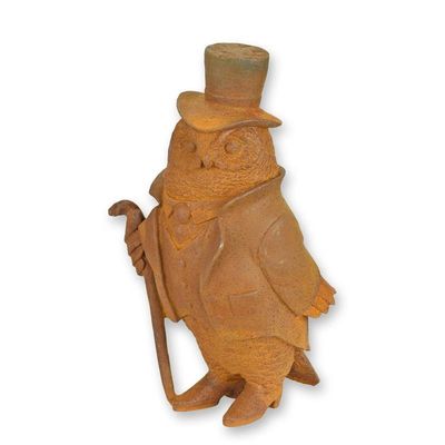 A RUSTY CAST IRON FIGURINE OF A GENTLEMAN OWL