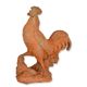 A RUSTY CAST IRON FIGURINE OF A ROOSTER