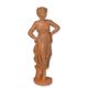 A RUSTY CAST IRON FIGURINE OF A WOMAN IN DRESS