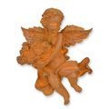 A RUSTY CAST IRON WALL MOUNT PUTTO HOLDING A FLOWER BASKET