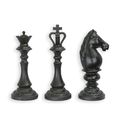 A SET OF 3 CAST IRON CHESS PIECES - BLACK
