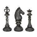 A SET OF 3 RESIN CHESS PIECES IN A MARBLE LOOK