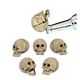 A SET OF 6 CAST IRON SKULL BOTTLE OPENERS