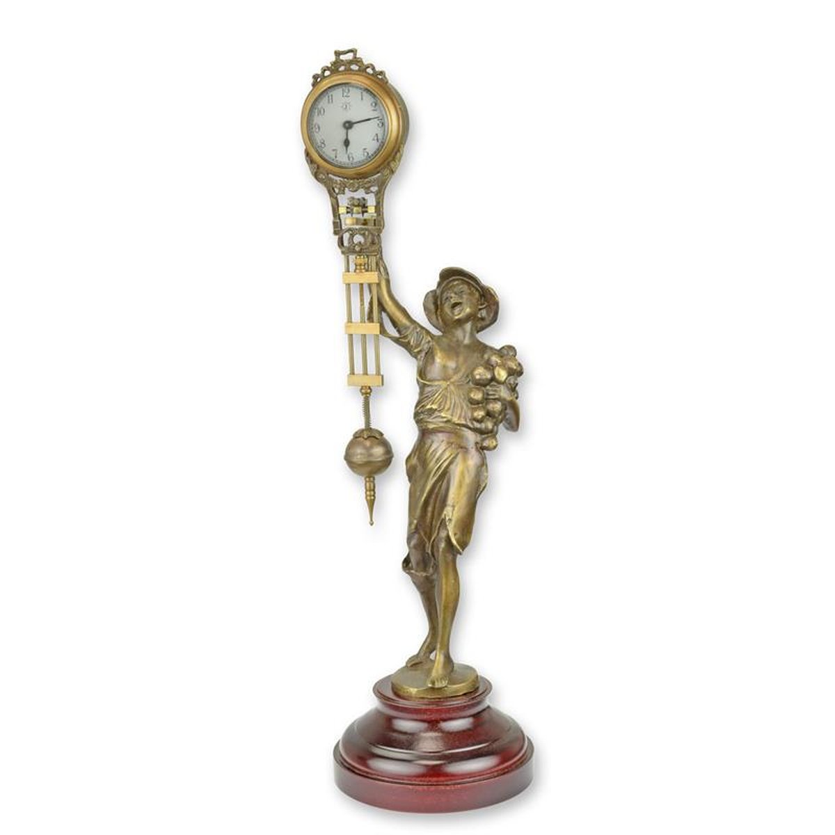 A TABLE CLOCK MYSTERIEUSE HELT BY A BOY