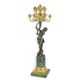 A THIRTEEN-LIGHT BRONZE FIGURAL CANDELABRUM ON MARBLE BASE