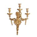 A THREE LIGHT GILT BRONZE WALL APPLIQUE