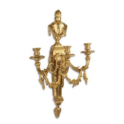 A THREE LIGHT GILT BRONZE WALL APPLIQUE