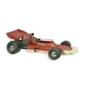A TIN MODEL OF A FORMULA 1 RACING CAR