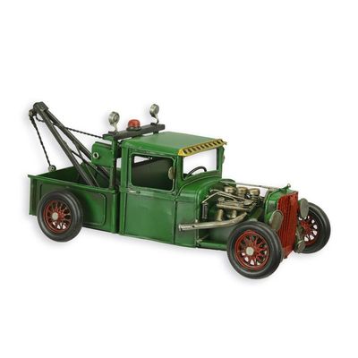 A TIN MODEL OF A HOT ROD TOW TRUCK
