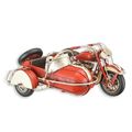 A TIN MODEL OF A MOTORCYCLE WITH SIDE CAR