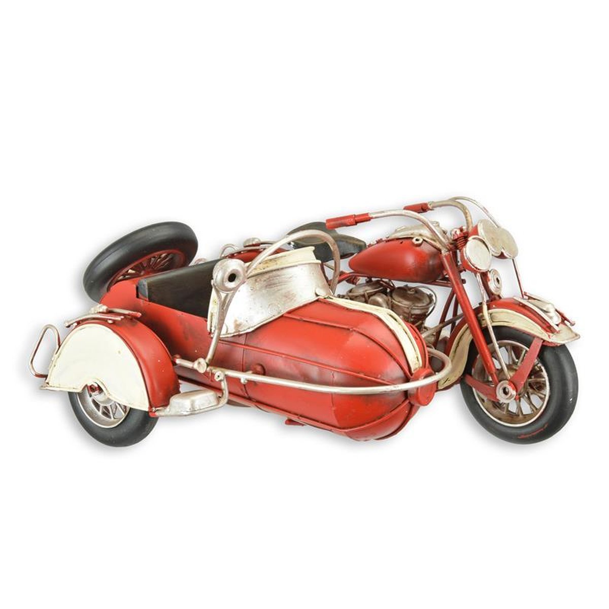 A TIN MODEL OF A MOTORCYCLE WITH SIDE CAR