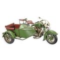 A TIN MODEL OF A MOTORCYCLE WITH SIDECAR