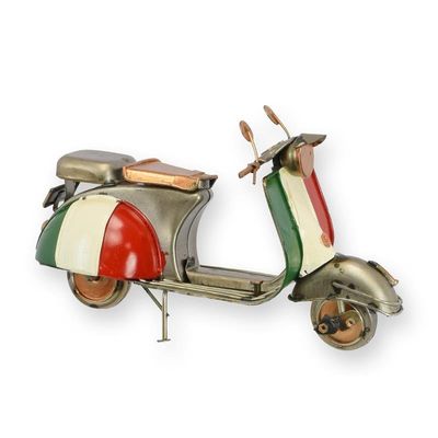 A TIN MODEL OF A SCOOTER