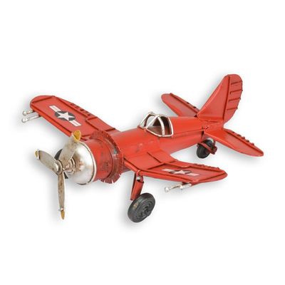 A TIN MODEL OF A SPITFIRE FIGHTER PLANE