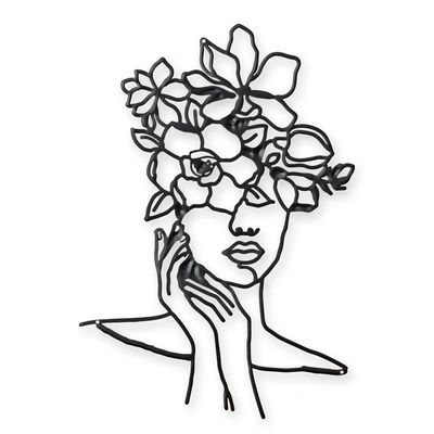 A TIN OUTLINE WALL DECOR - FACE WITH FLOWERS
