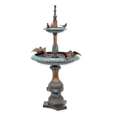 A TWO TIER BRONZE FOUNTAIN