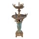 A TWO TIER BRONZE FOUNTAIN