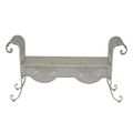 A WHITE IRON BENCH