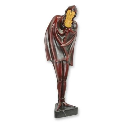 A WOOD MOUNTED BRONZE SCULPTURE OF MEPHISTOPHELES