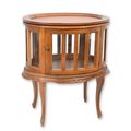 A WOODEN DUMBWAITER TEA TABLE - OVAL