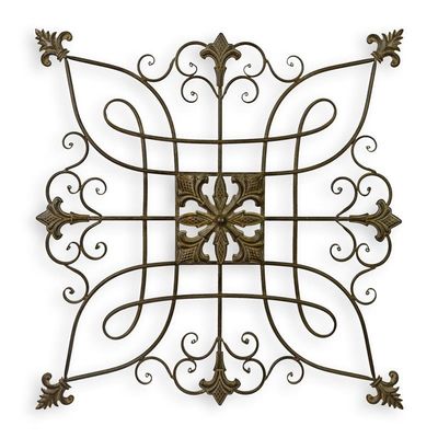 A WROUGHT IRON ORNAMENTAL WALL DECOR